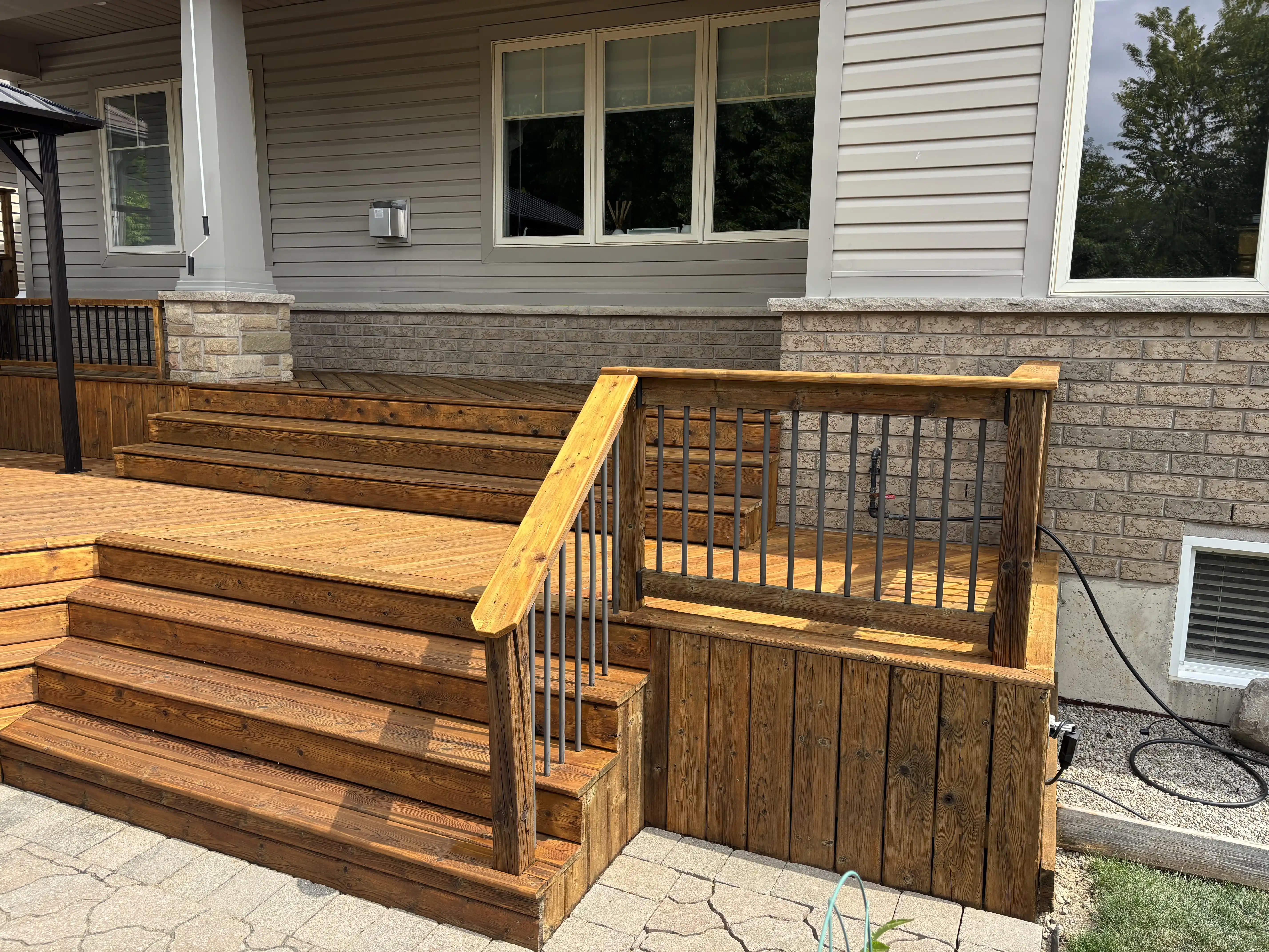 Deck Staining in Smithville — finished multi-level deck with pergola