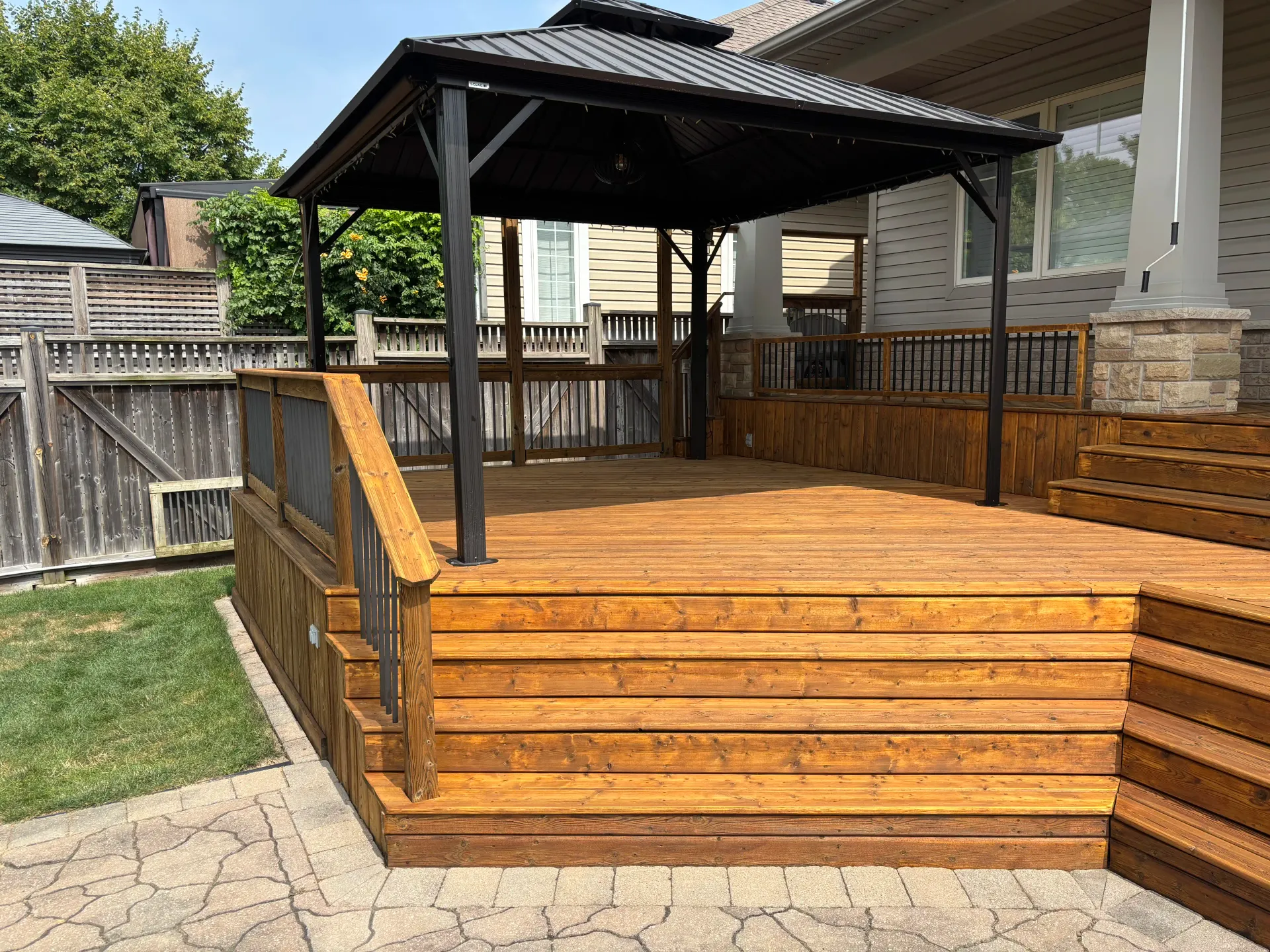 Smithville deck — railing and stair detail after staining