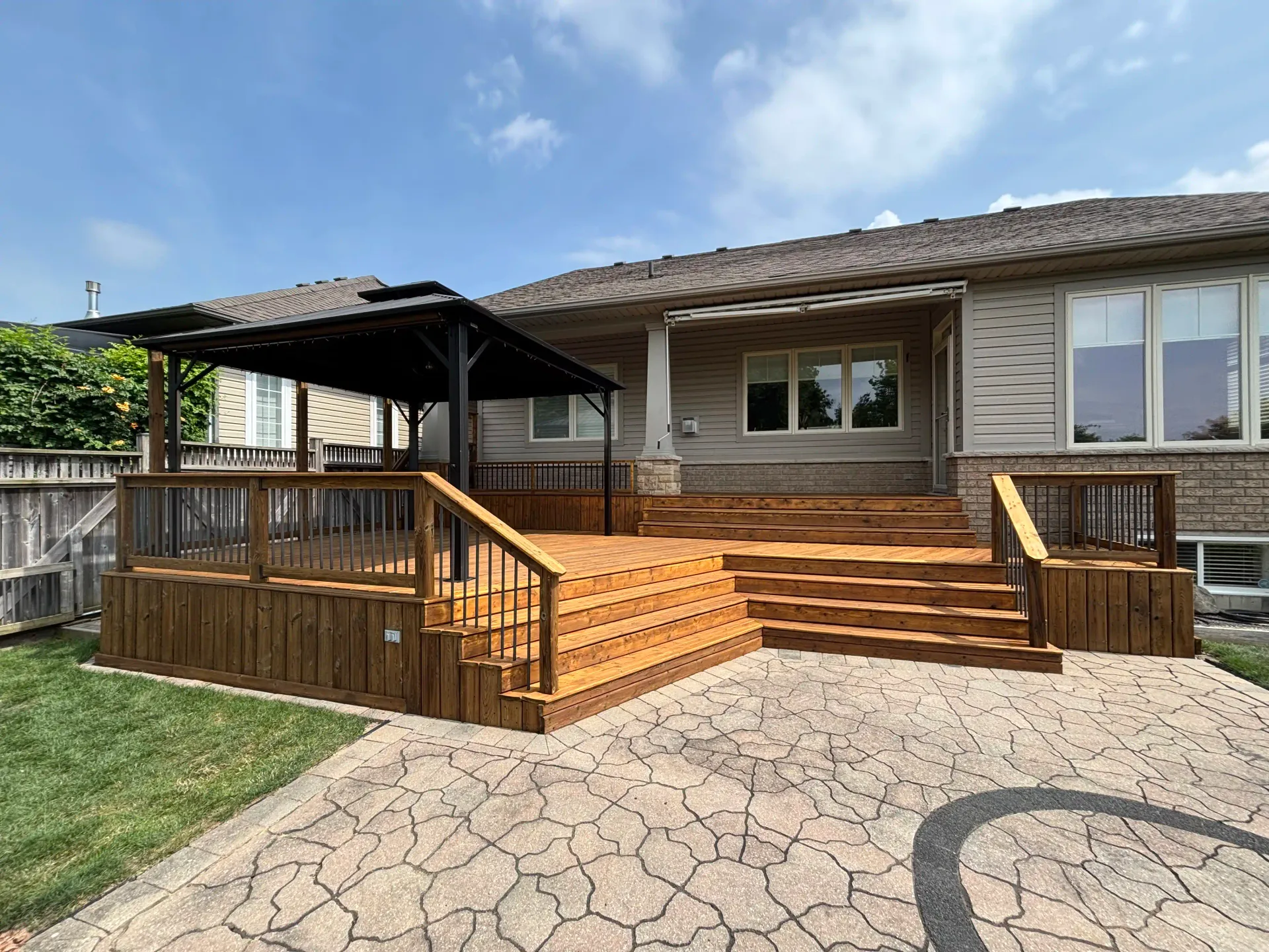 Smithville deck — pergola posts with steel brackets