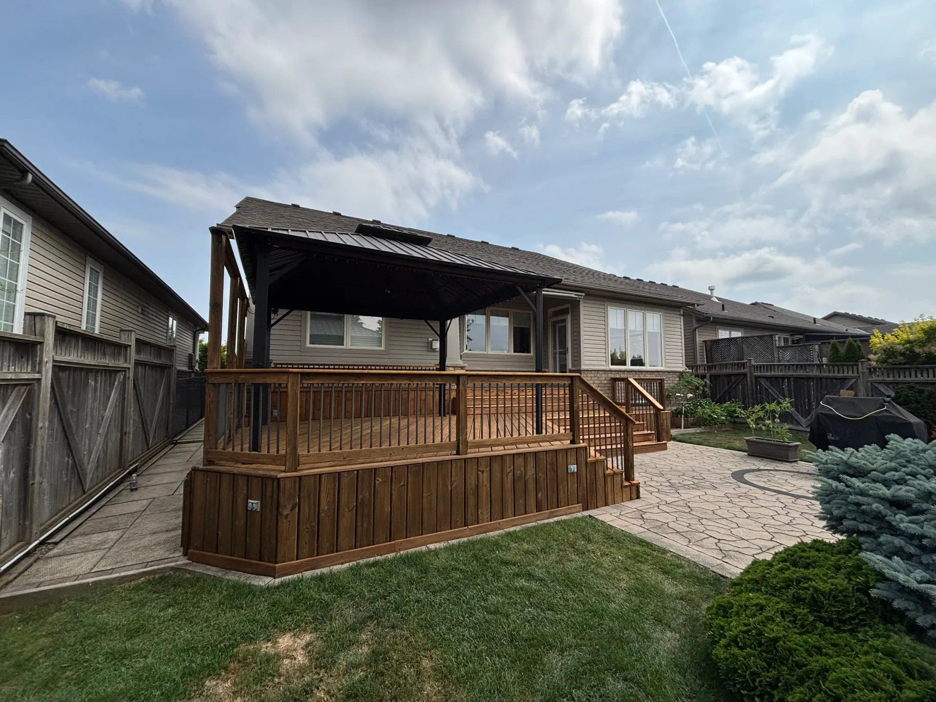 Smithville deck — stair stringers and railing after stain