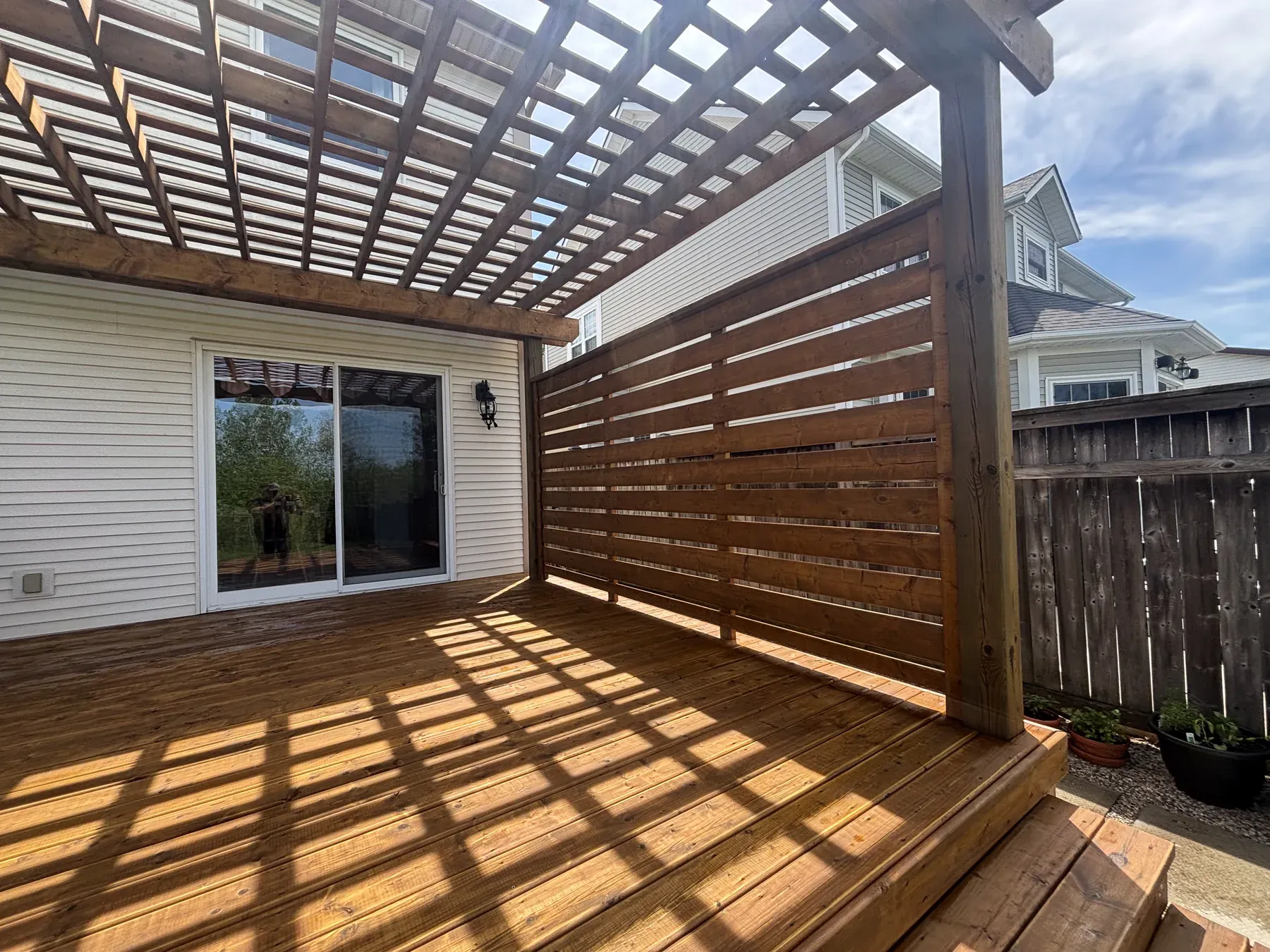 Niagara-on-the-Lake deck — close-up of first oil coat absorbing