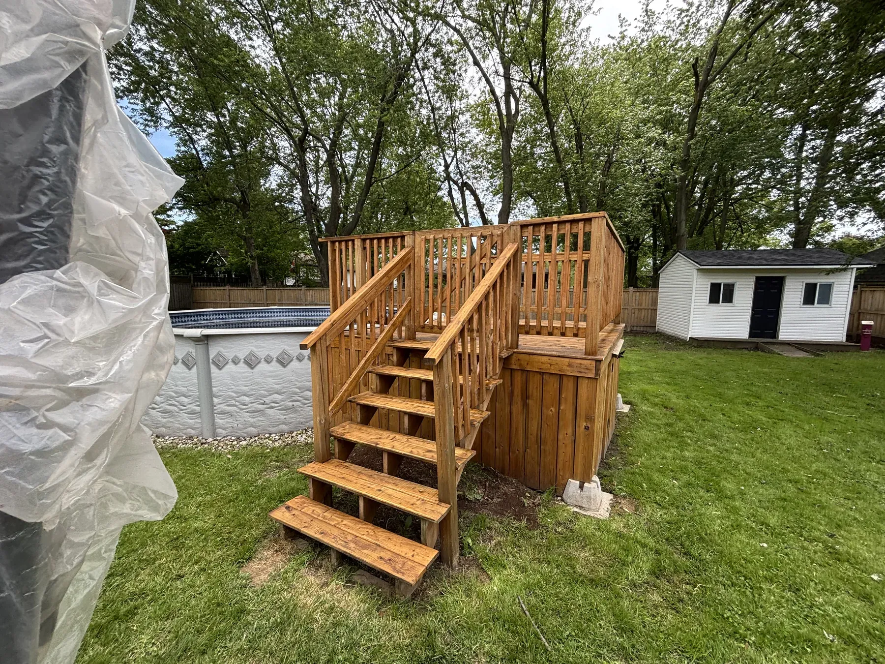 Fort Erie deck — close-up of re-stained floor boards